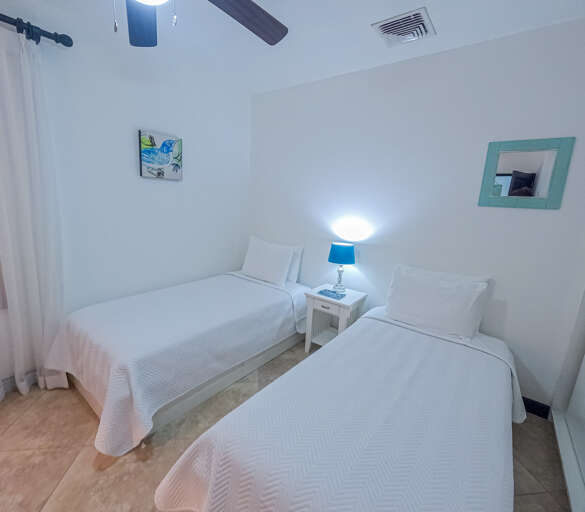 Bedroom #3 has two single beds. Perfect for kids or larger groups.  Bedroom #3 has two single beds. Perfect for kids or larger groups.