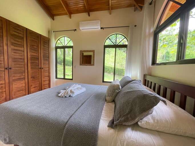 Upstairs bedroom #2 is queen size with A/C and ceiling fan.  Upstairs bedroom #2 is queen size with A/C and ceiling fan.