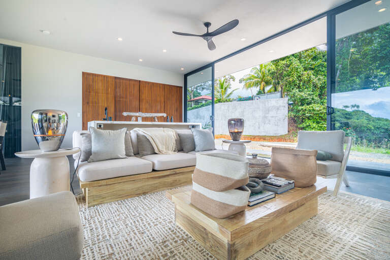 A modern living room with stylish furniture and a relaxing atmosphere. A modern living room with stylish furniture and a relaxing atmosphere.