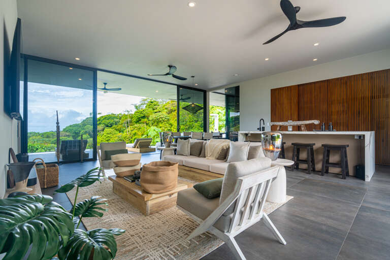 Relax in the spacious living room with ample natural light and breathtaking views of Pool. Relax in the spacious living room with ample natural light and breathtaking views of Pool.