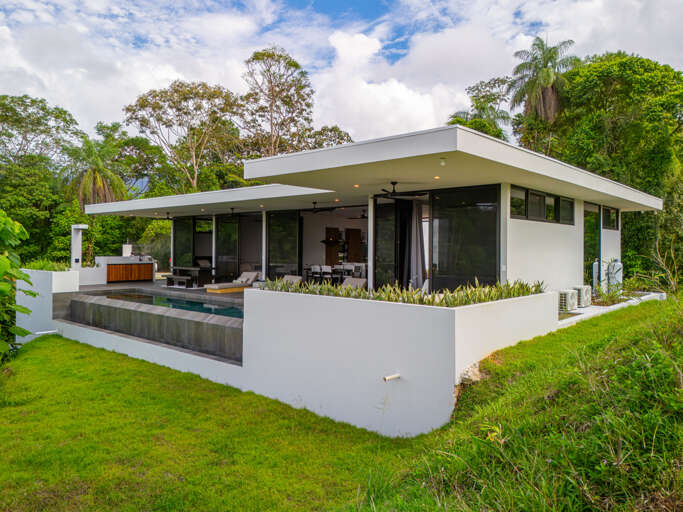 A unique home offering modern amenities in a peaceful, green setting. A unique home offering modern amenities in a peaceful, green setting.