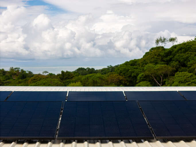 This energy-efficient house is powered by solar panels, offering clean, sustainable energy. This energy-efficient house is powered by solar panels, offering clean, sustainable energy.