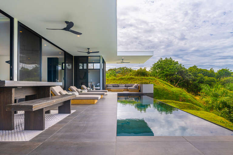 The pool area is designed for relaxation, featuring plenty of space to swim and lounge while enjoying the surroundings. The pool area is designed for relaxation, featuring plenty of space to swim and lounge while enjoying the surroundings.