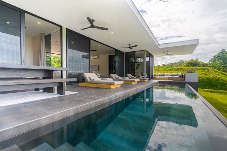 A modern pool area with scenic views A modern pool area with scenic views