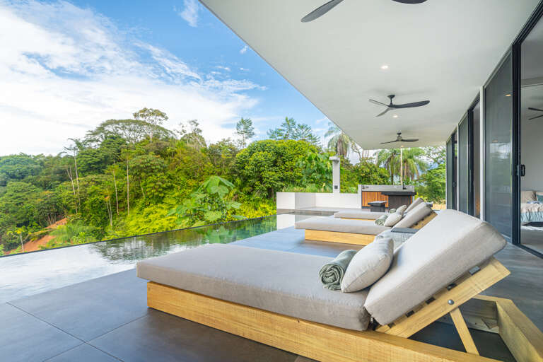 An elegant pool area offering stunning views, perfect for relaxing and enjoying the scenery. An elegant pool area offering stunning views, perfect for relaxing and enjoying the scenery.