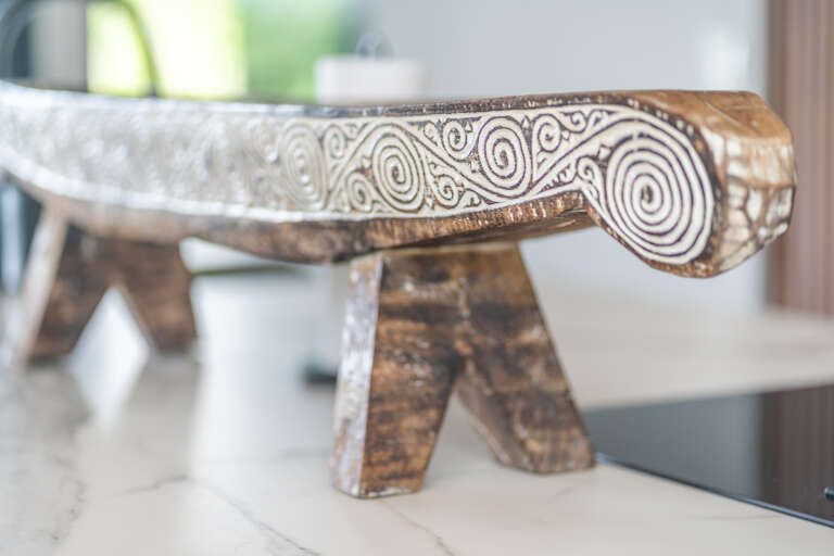 A statement piece of furniture or sculpture adds character and elegance A statement piece of furniture or sculpture adds character and elegance