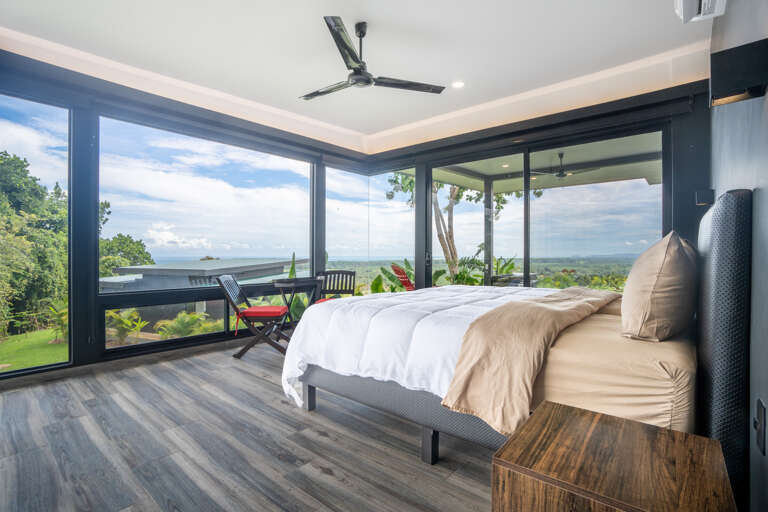 Second Bedroom has panoramic ocean views and private access to the swimming pool and patio area Second Bedroom has panoramic ocean views and private access to the swimming pool and patio area