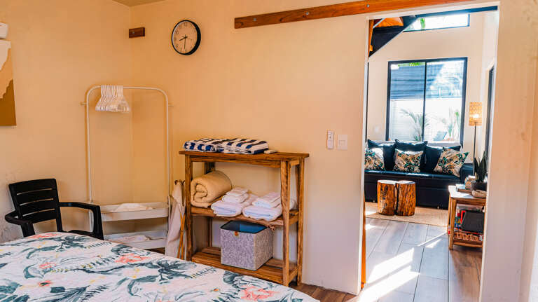 A spacious master bedroom with direct access to the living room A spacious master bedroom with direct access to the living room