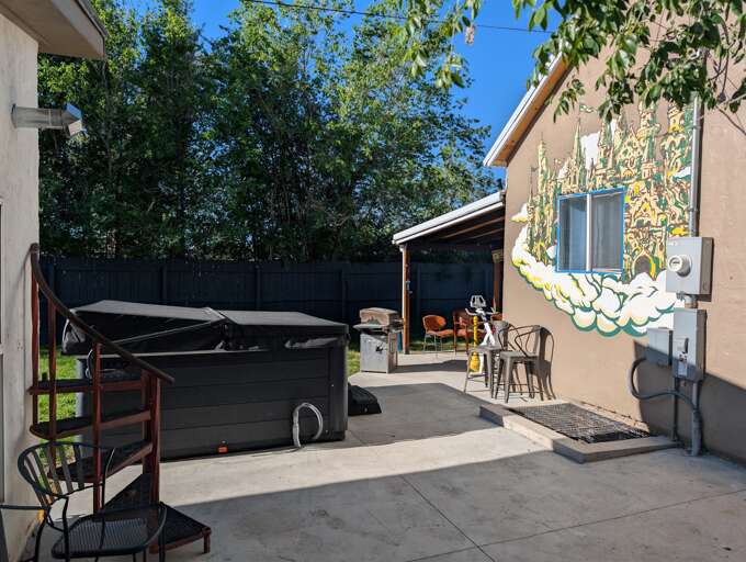 Unwind in the hot tub — peaceful, private patio