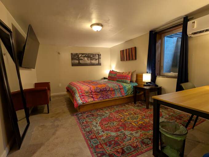 Comfortable bedroom with smart TV