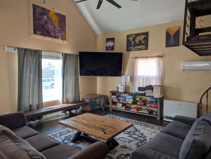 Living lounge — board games, sofas & TV