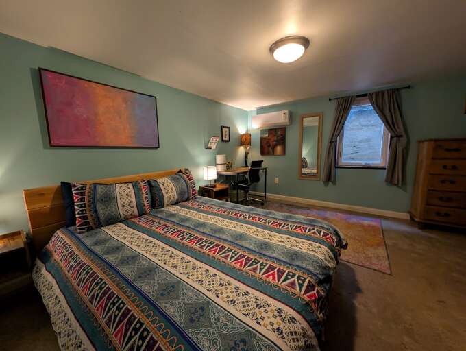 Restful bedroom with a desk for remote work