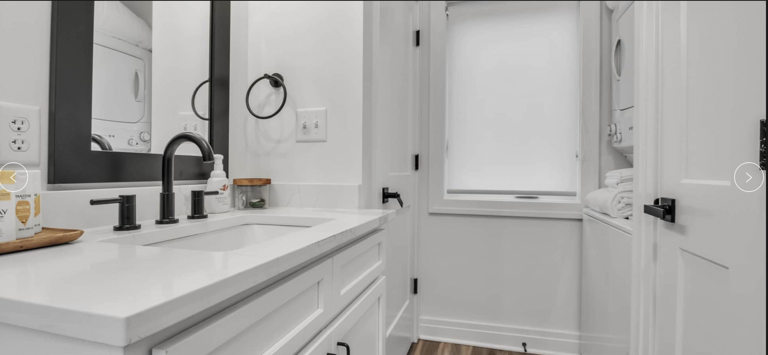 Modern Kitchen Interior With White Cabinets And Appliances