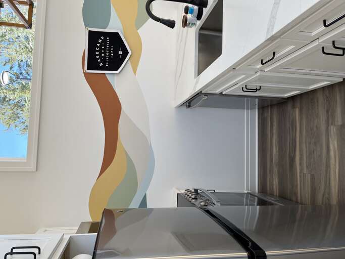 Modern Kitchen Interior With Wave-patterned Wall
