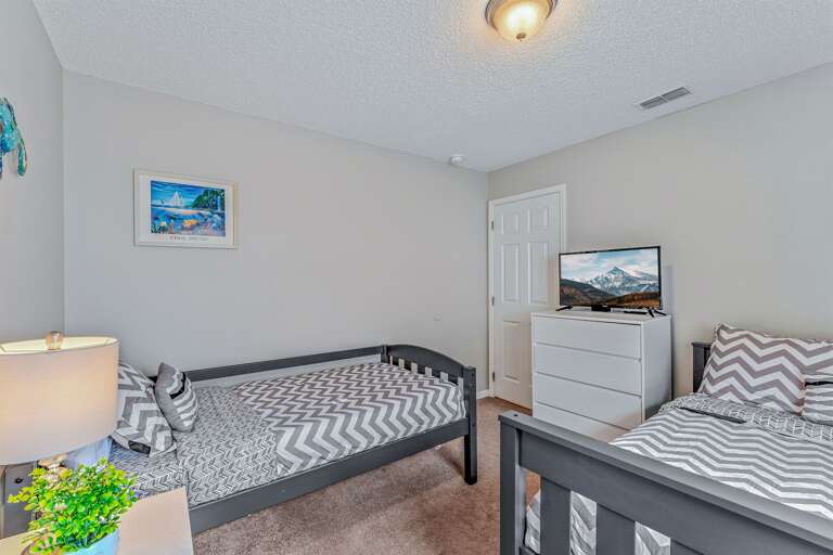 Bedroom 3 with twin and full beds