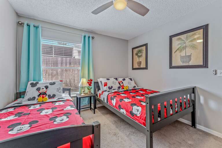 Bedroom 2 with twin and full beds, TV