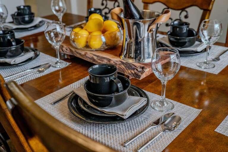 Dining table - seats 8 (wine is not included, for staging purposes only)