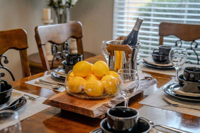 Dining table - seats 8 (wine is not included, for staging purposes only)