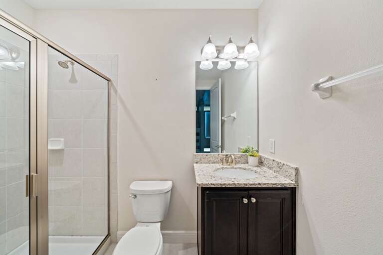 Bathroom with glass enclosed shower