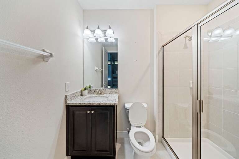 Bathroom with glass enclosed shower