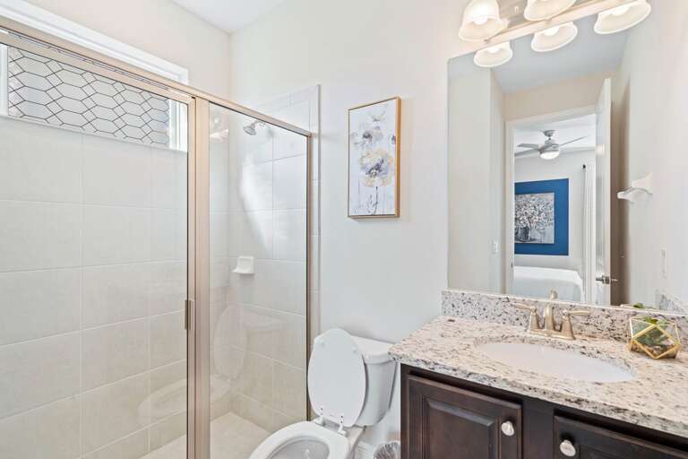 Bathroom with glass enclosed shower