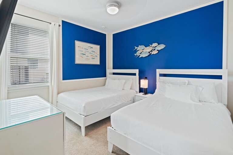 Bedroom with dual Full beds