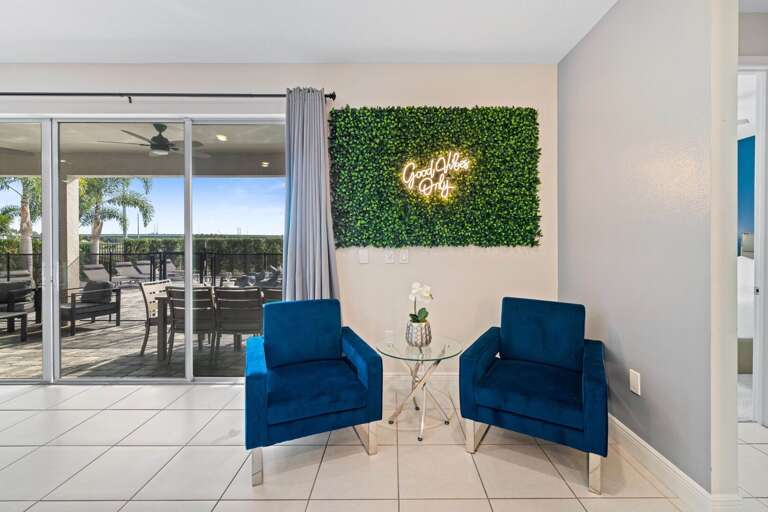 Living area and access to pool deck