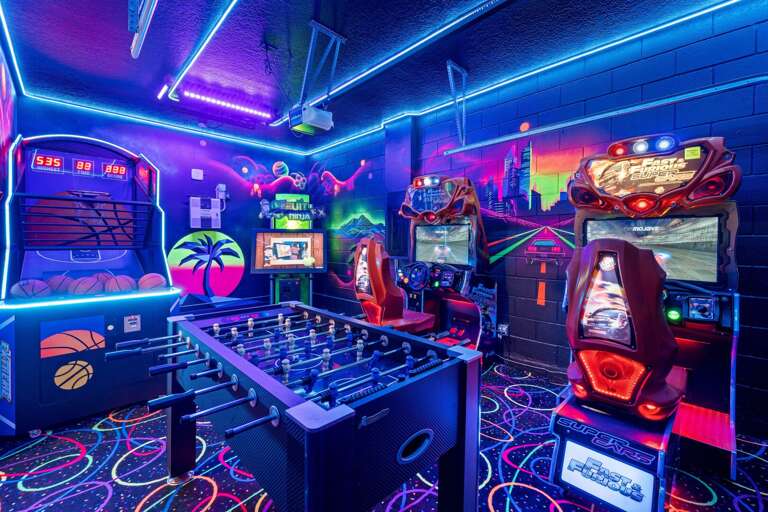 Themed game room with arcades and foosball
