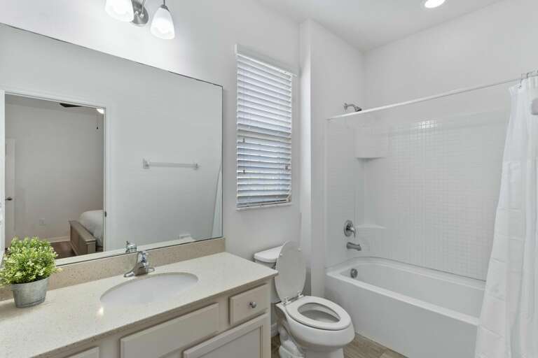 Bathroom with bathtub/ shower combo Bathroom with bathtub/ shower combo