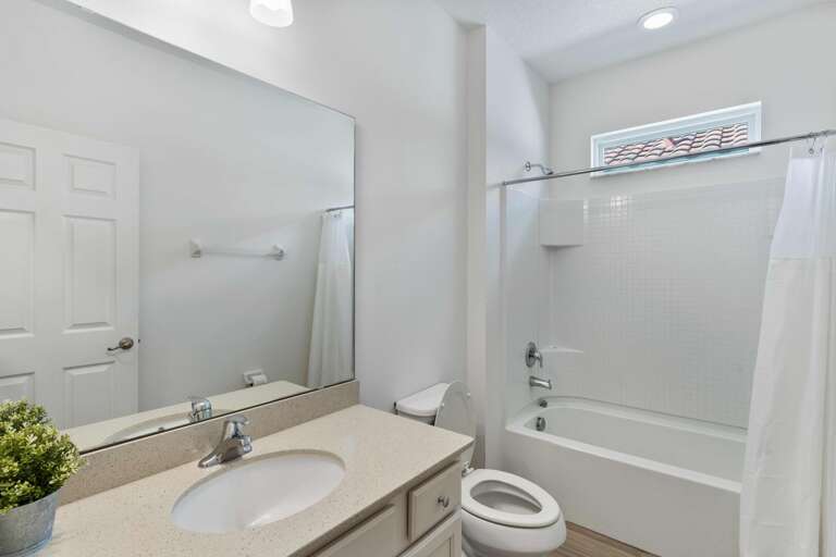 Bathroom with bathtub/ shower combo Bathroom with bathtub/ shower combo