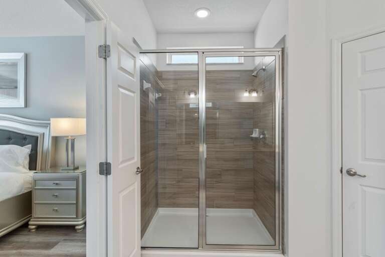 Bathroom with glass enclosed shower Bathroom with glass enclosed shower