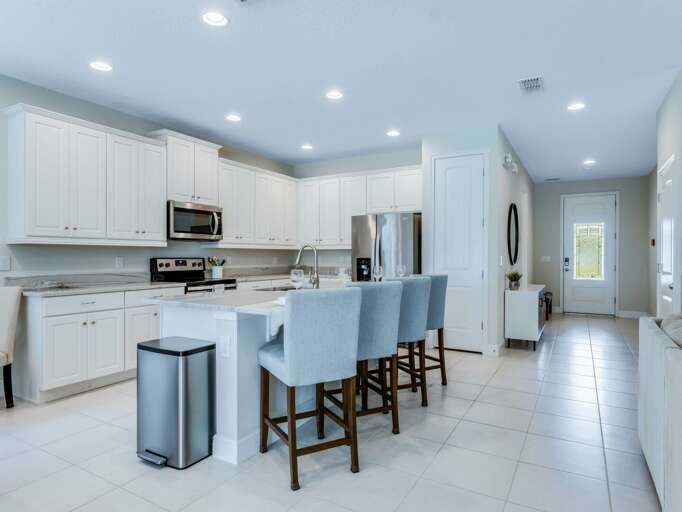 Kitchen area with stainless-steel appliances and spacious island