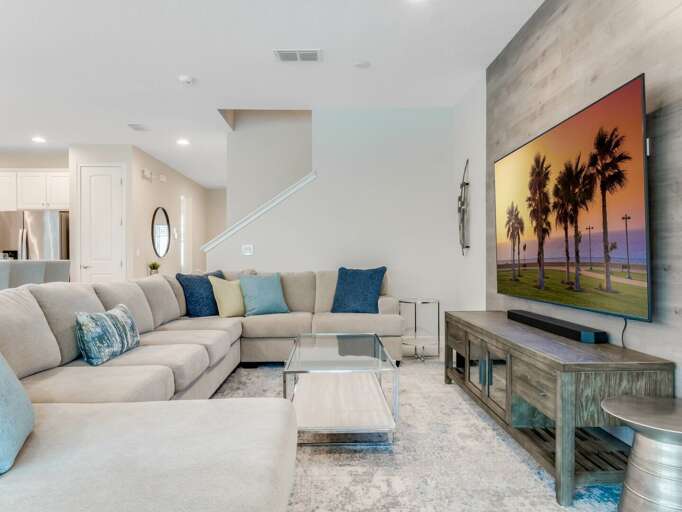 Living area with flat screen TV and comfy couch