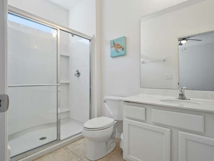 Bathroom with glass enclosed shower