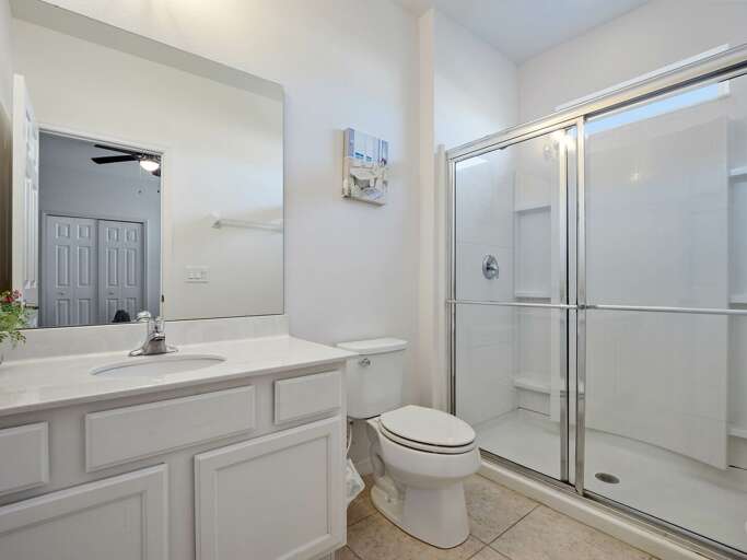 Bathroom with glass enclosed shower