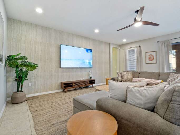 Living area with comfy sectional sofa and flat screen TV
