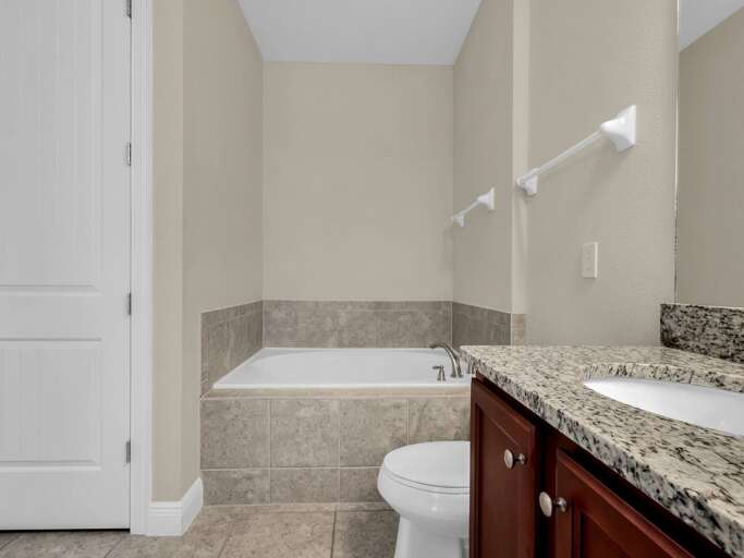 Bathroom with dual sinks and soaker tub Bathroom with dual sinks and soaker tub