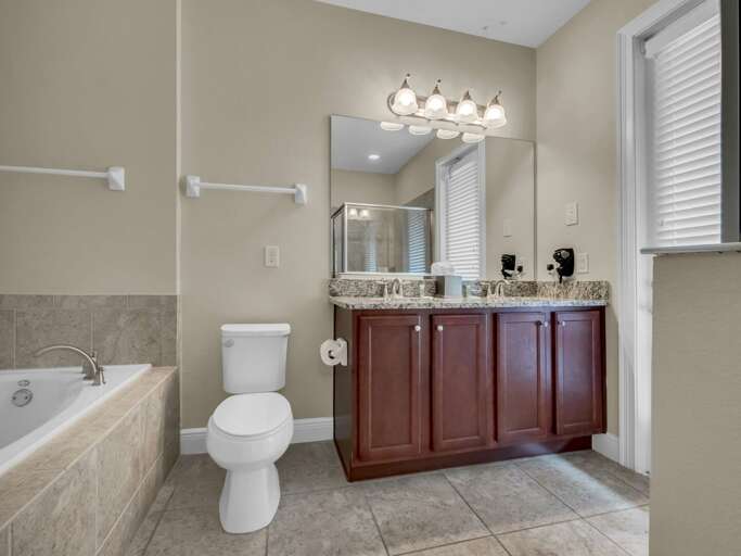 Bathroom with dual sinks and soaker tub Bathroom with dual sinks and soaker tub
