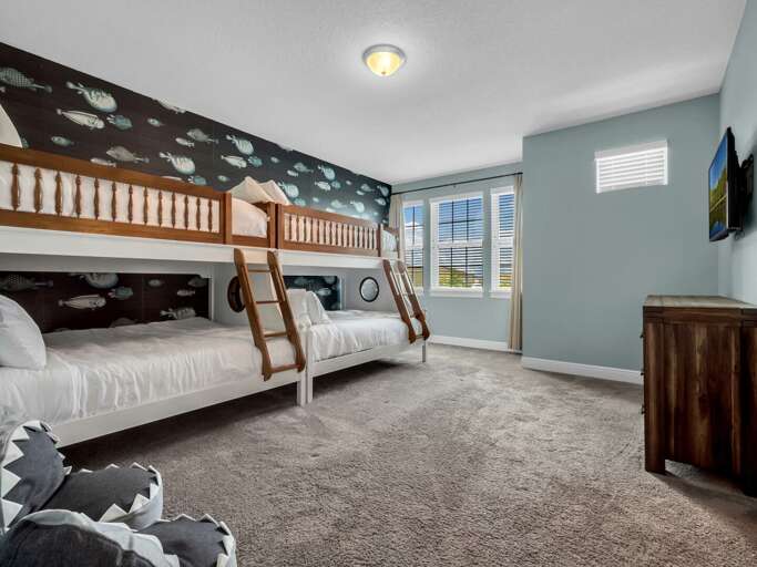 Bedroom with dual Twin over Full bunk beds Bedroom with dual Twin over Full bunk beds