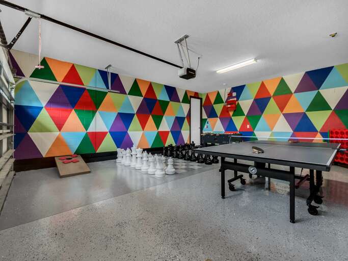 Game room with life-size chess, ping pong, and foosball Game room with life-size chess, ping pong, and foosball