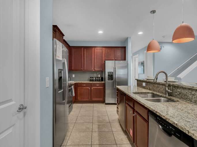 Kitchen area with stainless steel appliances, and spacious island Kitchen area with stainless steel appliances, and spacious island