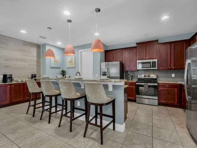 Kitchen area with stainless steel appliances, and spacious island Kitchen area with stainless steel appliances, and spacious island