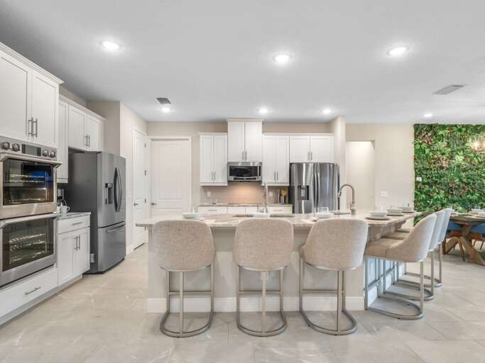 Kitchen area with stainless steel appliances and spacious island