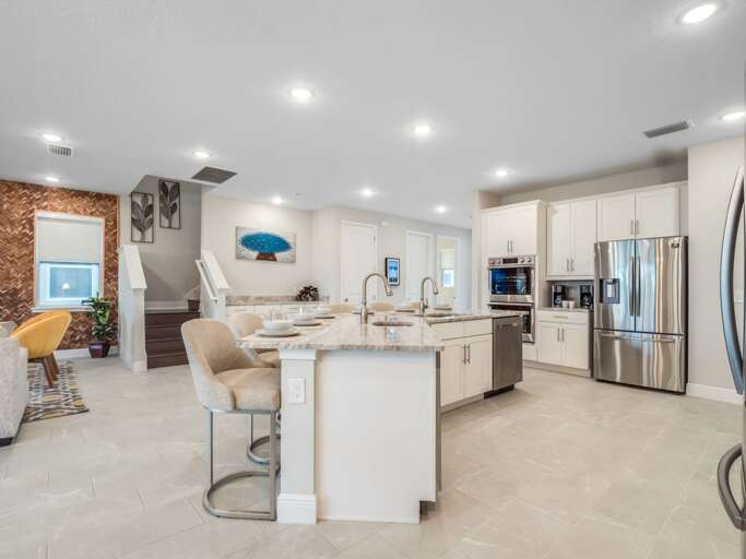 Kitchen area with stainless steel appliances and spacious island