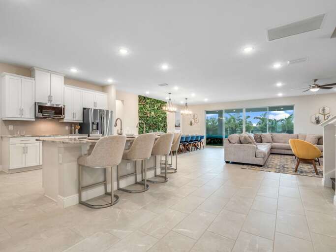 Kitchen area with stainless steel appliances and spacious island