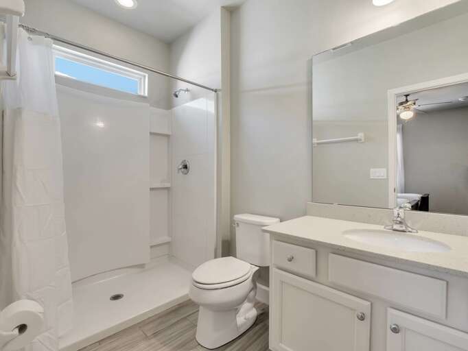 Bathroom with bathtub and shower combo