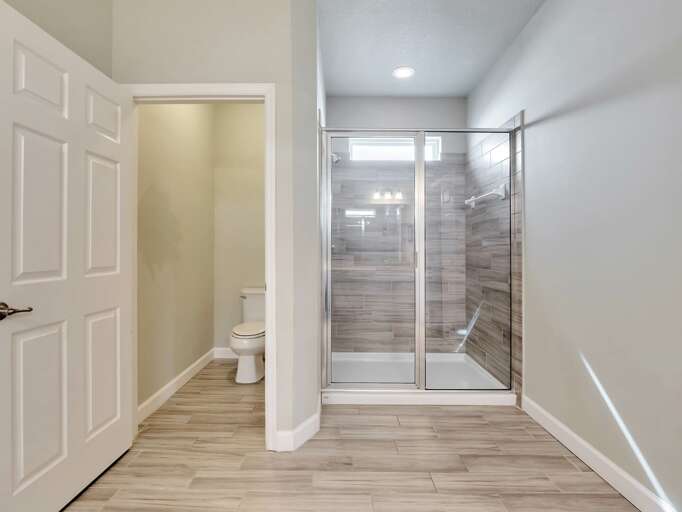 Bathroom with glass enclosed shower