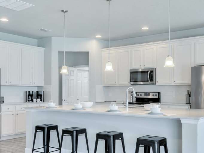 Kitchen area with stainless steel appliances and spacious island