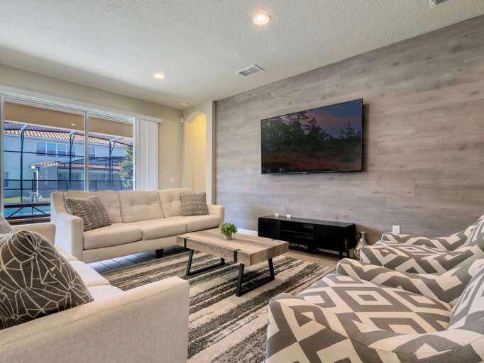 Living area with comfy sectional sofa and flat screen TV