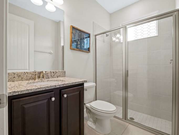 Bathroom with glass enclosed shower